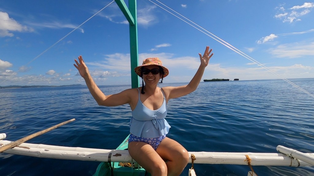 Heading out on our first boat surf